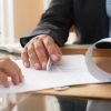 Firma del contrato de un seguro de exequias